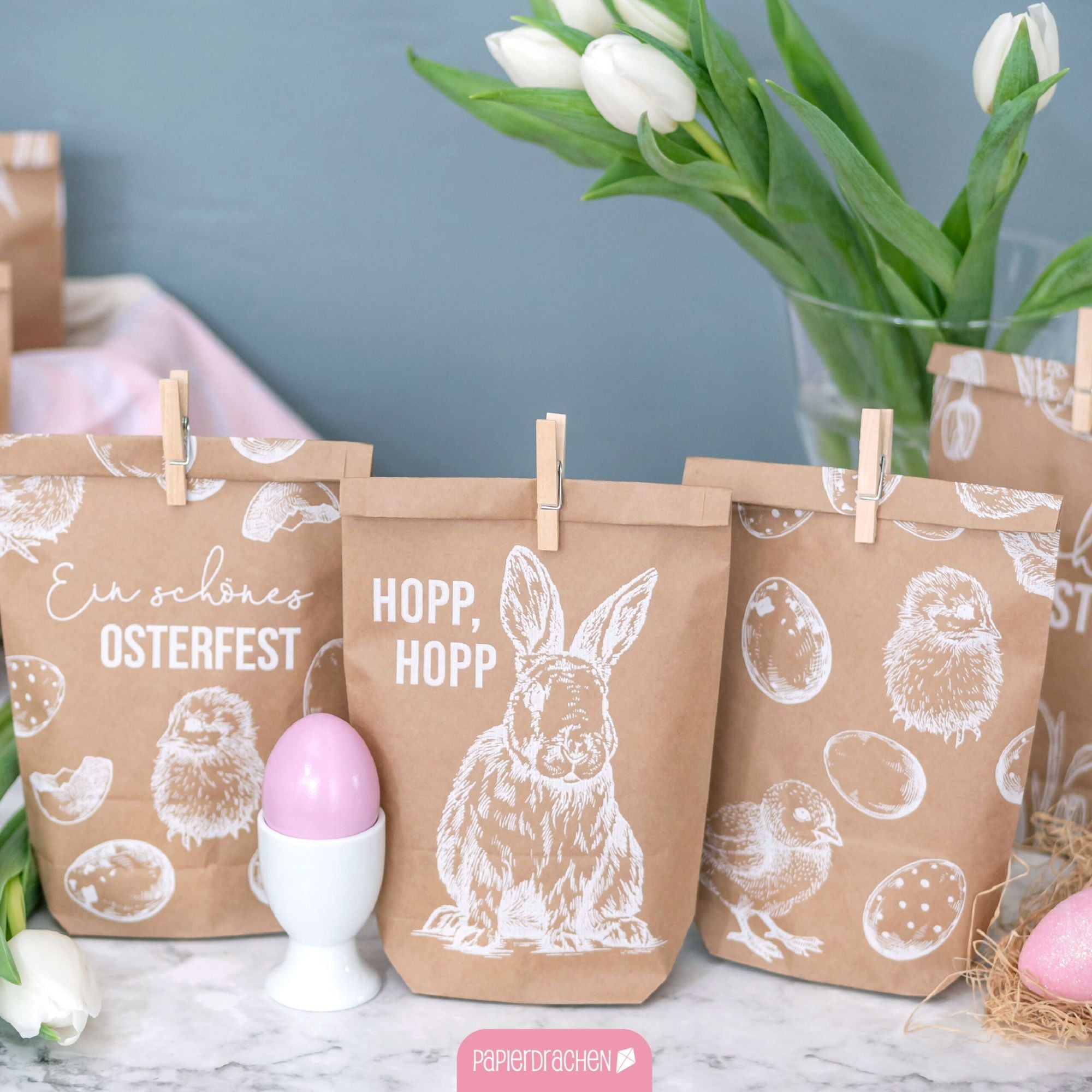 12 weiß bedruckte Geschenktüten Ostern Papierdrachen - malmichbunt.de